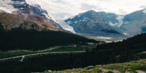 A scenic view of a national park with accessible trails at sunrise.