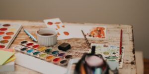A peaceful watercolor painting workspace with natural light.