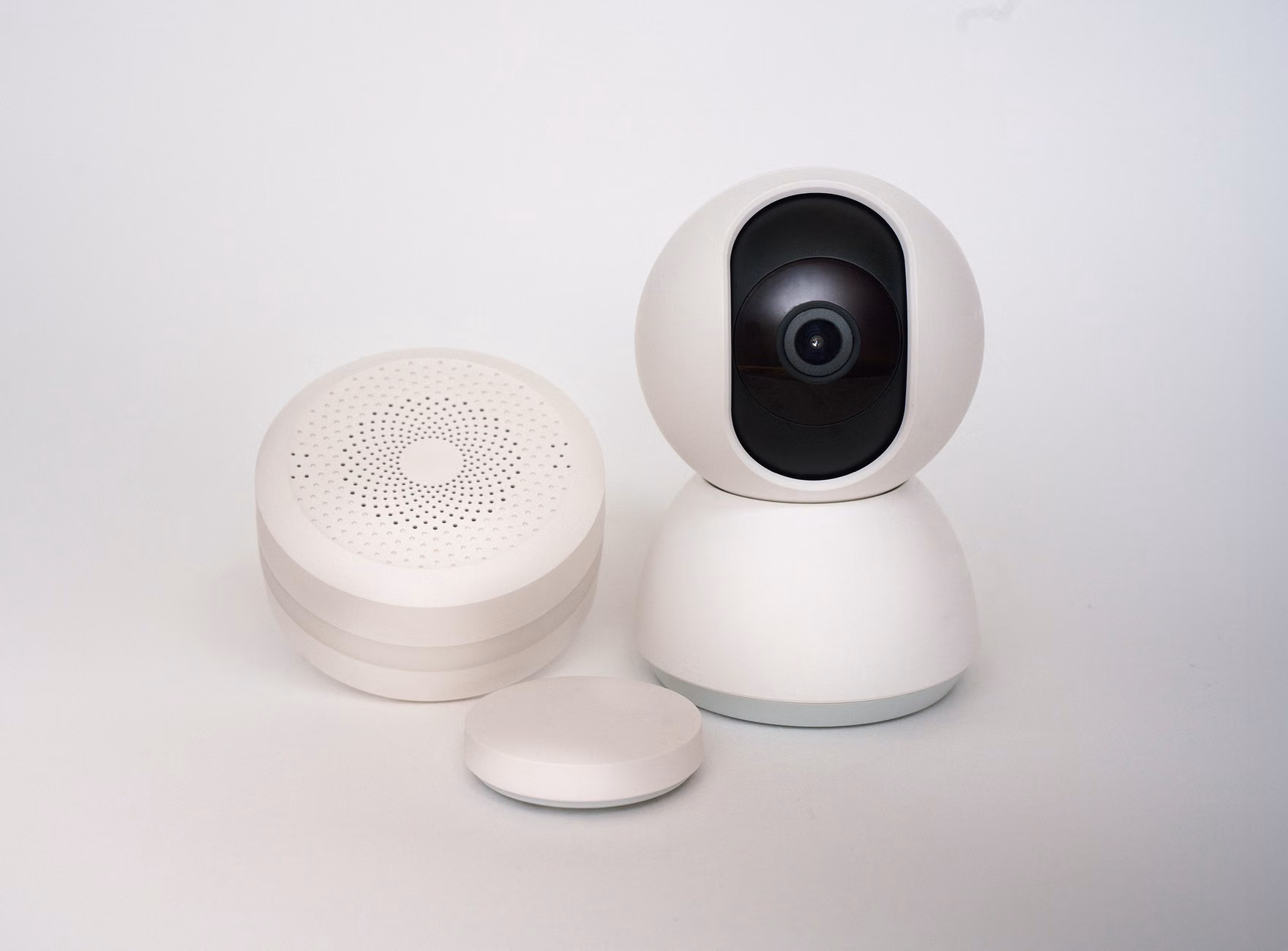2026 Smart Home Energy Management: A Practical Guide for Independent Living 2 A smart home sensor unit installed on a wall, sleek design, integrated with home automation.