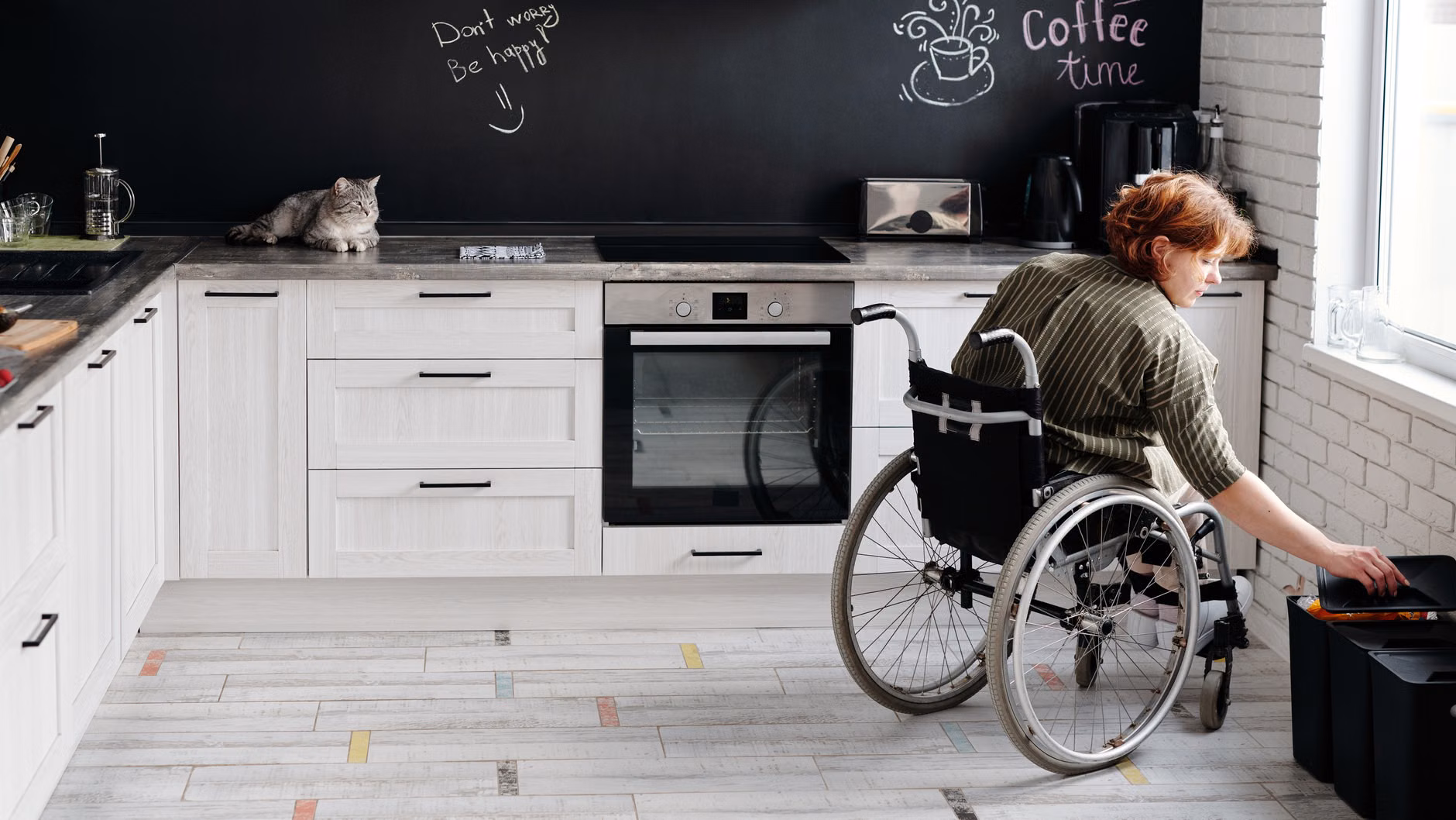 2026 Housing Trends: Navigating the Expansion of Intergenerational Living Projects 2 The interior of a modern, accessible, and senior-friendly kitchen.