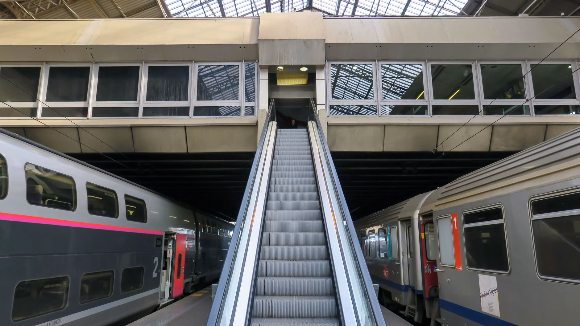 Mastering Regional Train Stations: A Practical Guide for Senior Travelers 2 Accessible elevator at a train station platform for senior passengers.