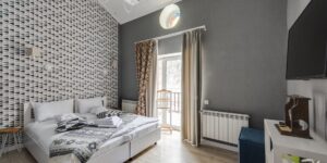 A bright, accessible hotel room designed for senior comfort.