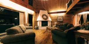 A warm and inviting living room featuring optimized lighting for senior comfort and safety.