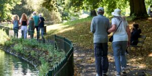 A senior couple enjoying a walk through a vibrant, accessible local market.