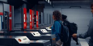 A modern, accessible train station with senior travelers preparing for a trip.