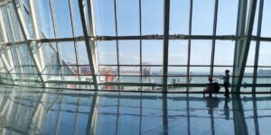 A bright, modern ferry terminal with panoramic sea views.