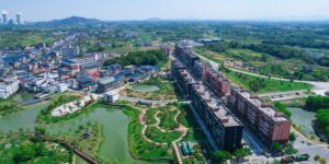 A modern intergenerational housing community featuring shared green spaces and inclusive architecture.