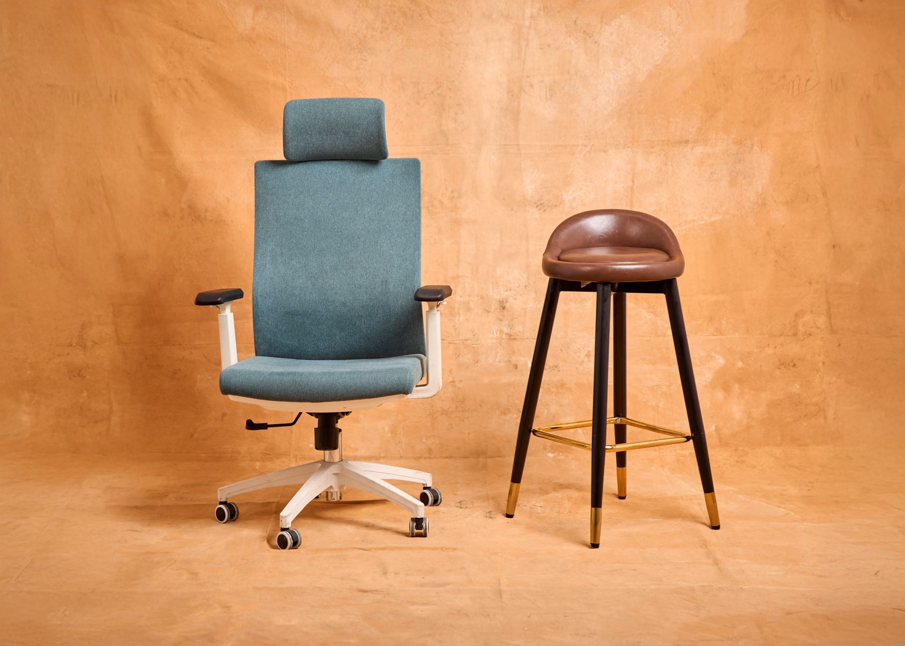 Ergonomic library chair featuring firm armrests and lumbar support.