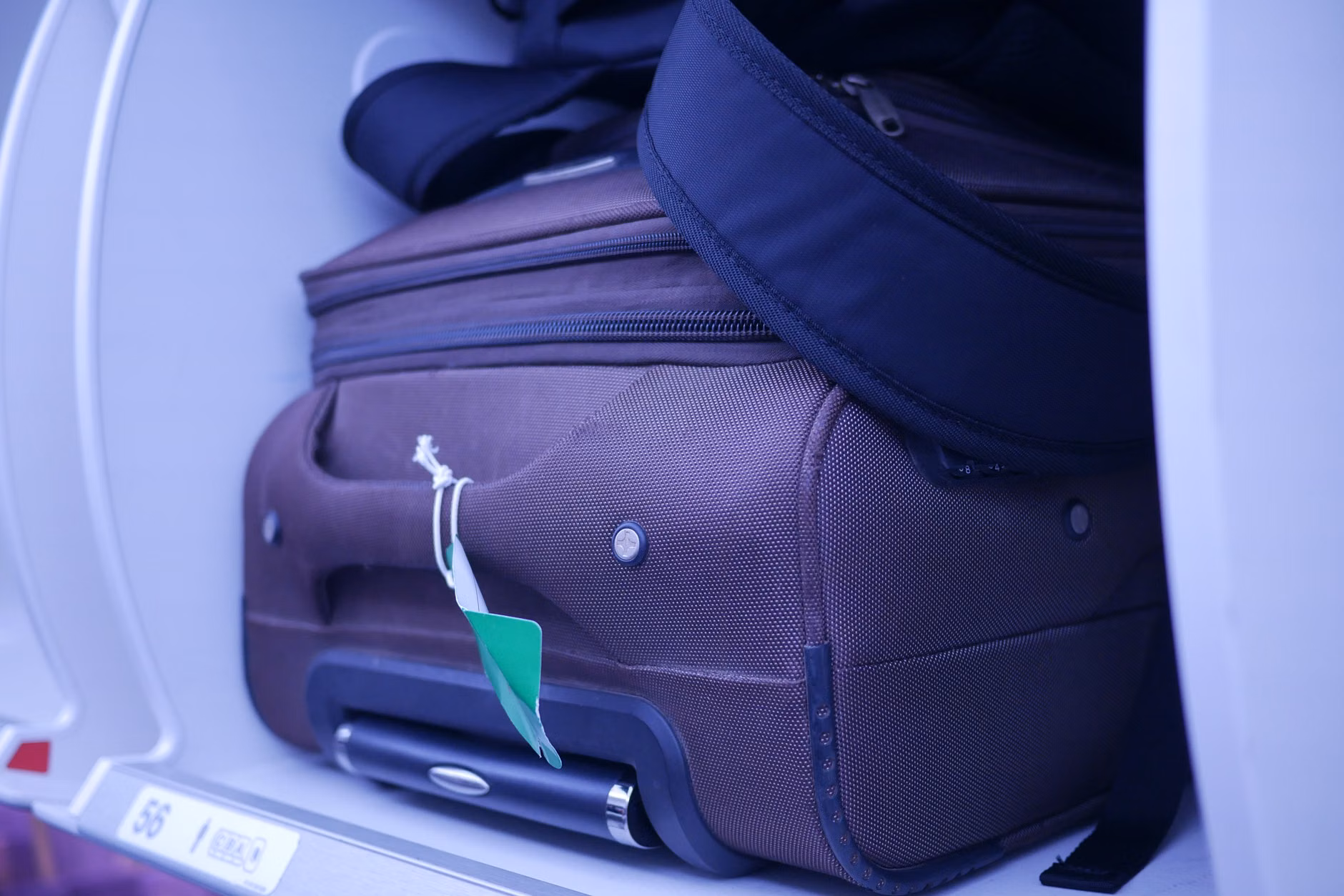 Close-up of packing cubes inside a suitcase for organized travel.
