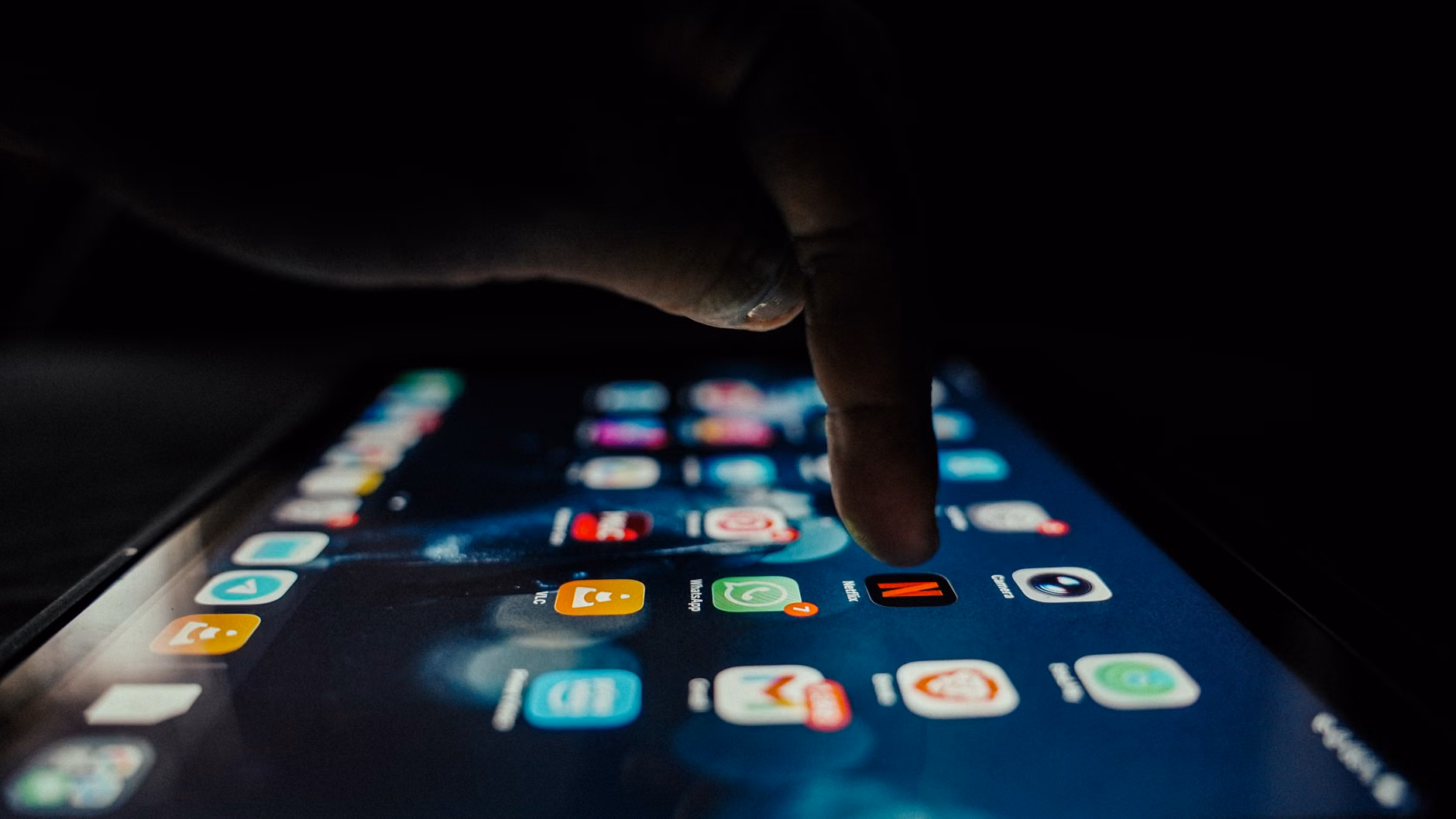 2026 Global Digital Accessibility Laws: What You Need to Know 1 Close-up of a senior person navigating a high-contrast digital interface on a smartphone.