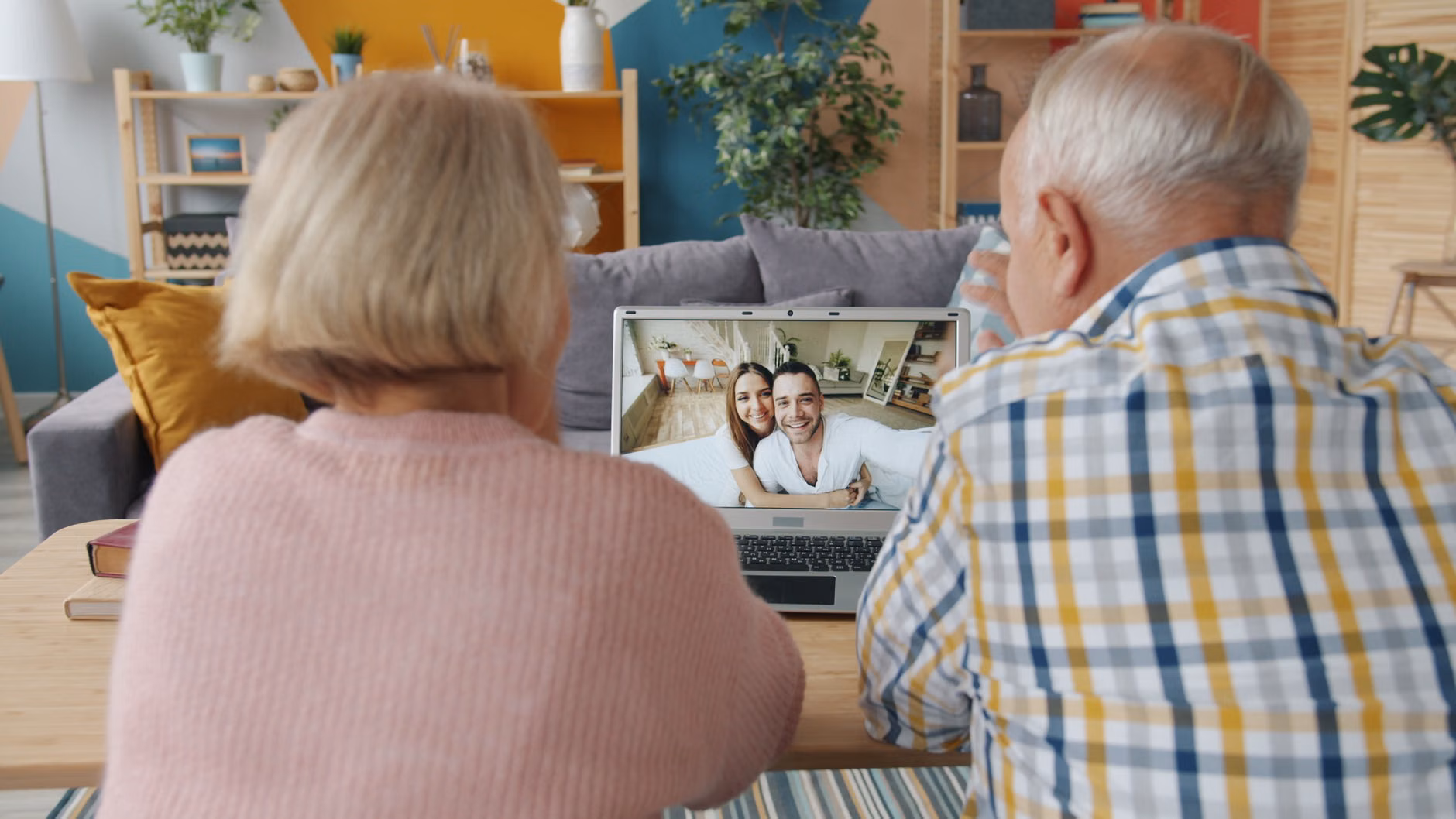 Tracing Your Roots: A Practical Guide to the Cognitive Joy of Genealogy 2 Older adult interacting with a digital family tree on a tablet.
