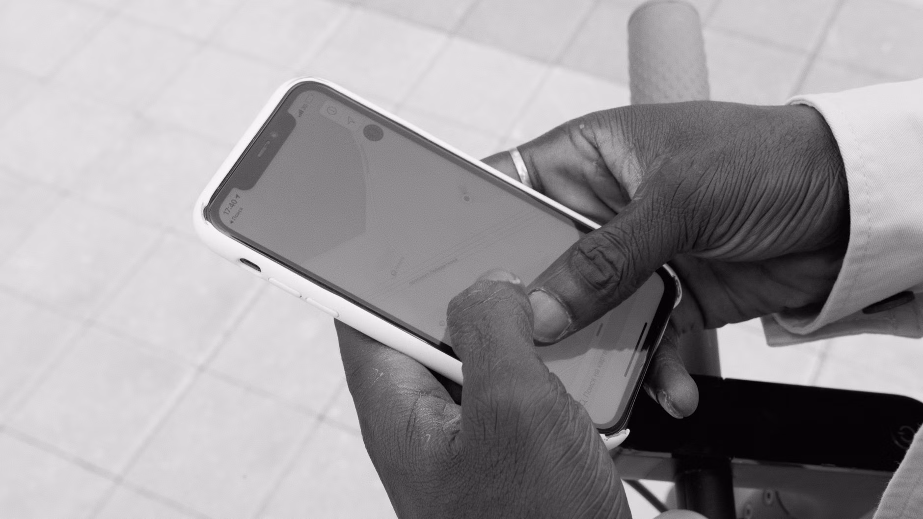 2026 Digital Privacy Rights: A Practical Guide for Seniors 2 Close-up of an older adult's hands navigating a smartphone security menu.