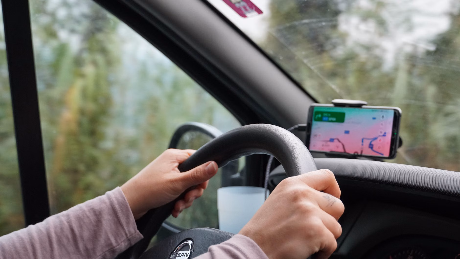 Navigating the 2026 Digital Public Portal Standards: A Guide for Seniors 2 Close-up of hands using voice-assisted digital navigation tools.