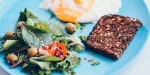 A healthy, balanced meal featuring manganese-rich ingredients like grains and nuts.