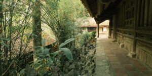 A peaceful stone path leading to a historic temple, representing accessible heritage travel.