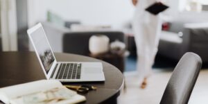 A clean, modern home office workspace representing digital financial management.