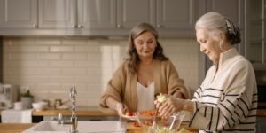An active senior preparing a nutritious meal in a kitchen.