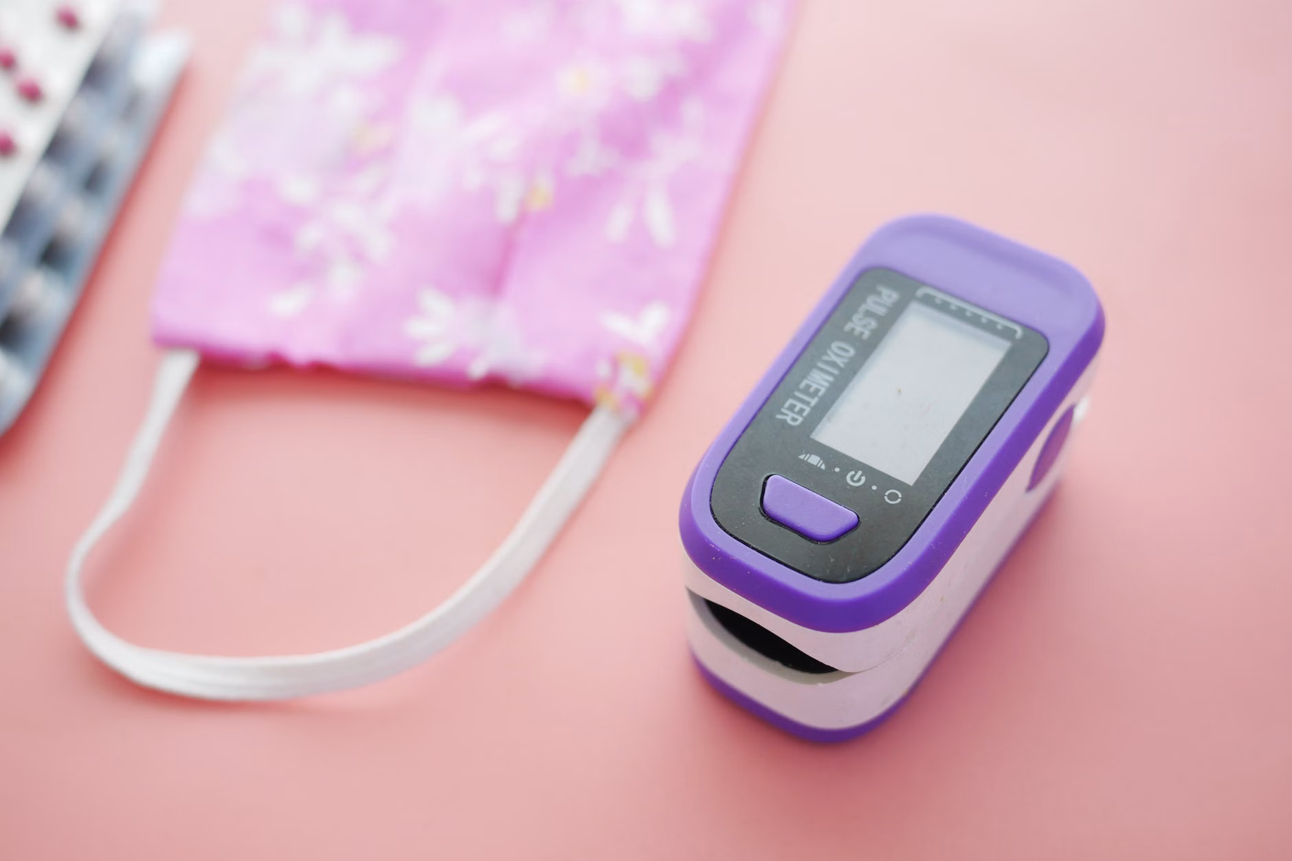 Minimalist Packing for High-Altitude Travel: A Mobility-First Guide for Seniors 1 Travel health essentials including an organizer and pulse oximeter.