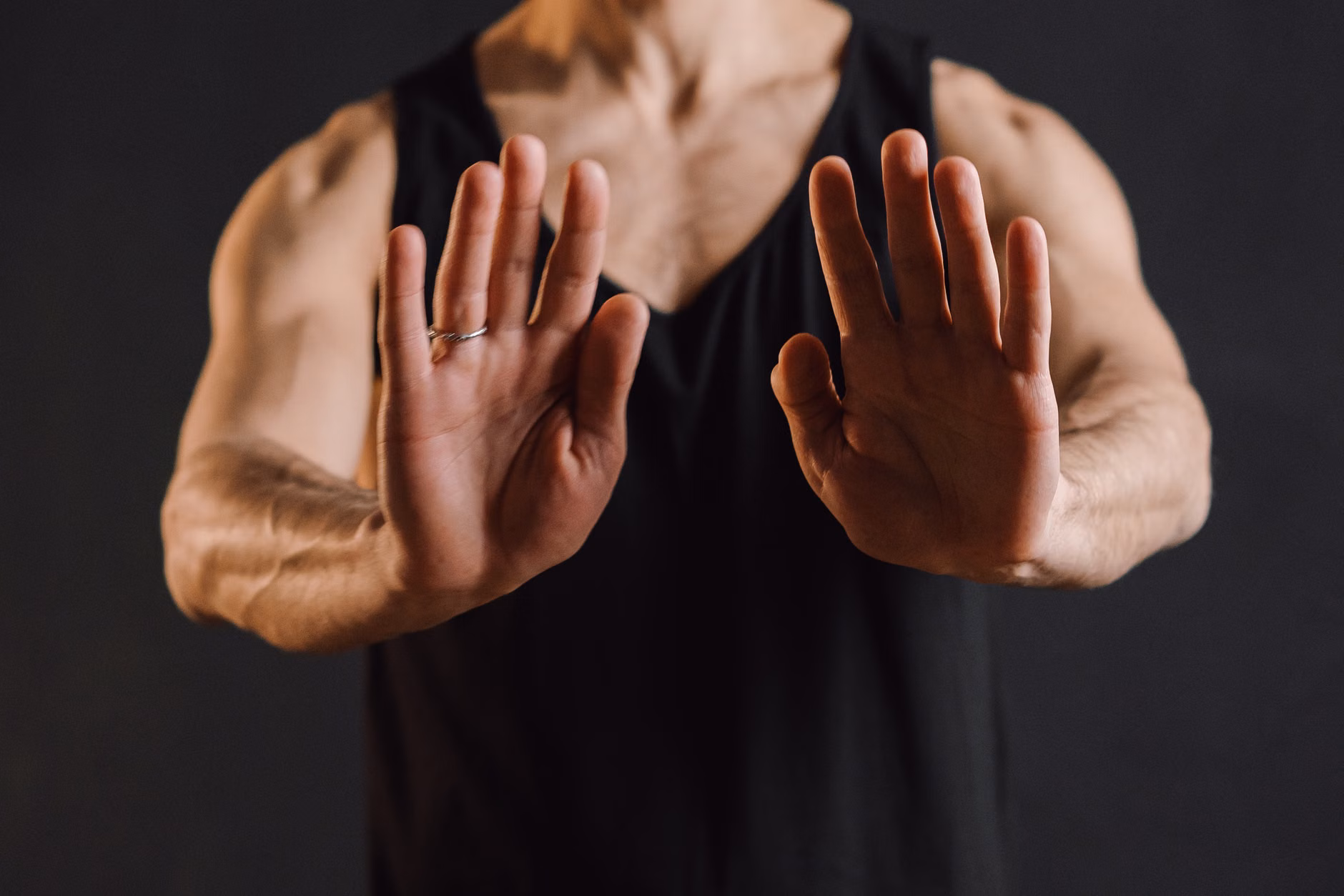 Hand placement for frontal neck isometric exercise.