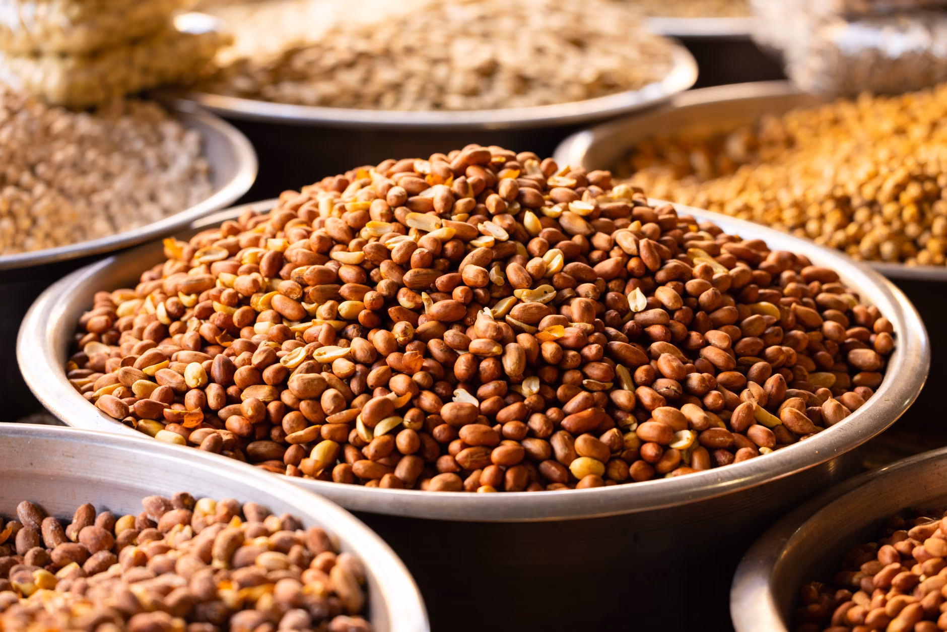 Dietary Boron: A Practical Guide to Supporting Bone Density and Joint Health 1 Close-up of various nuts and legumes in bowls.