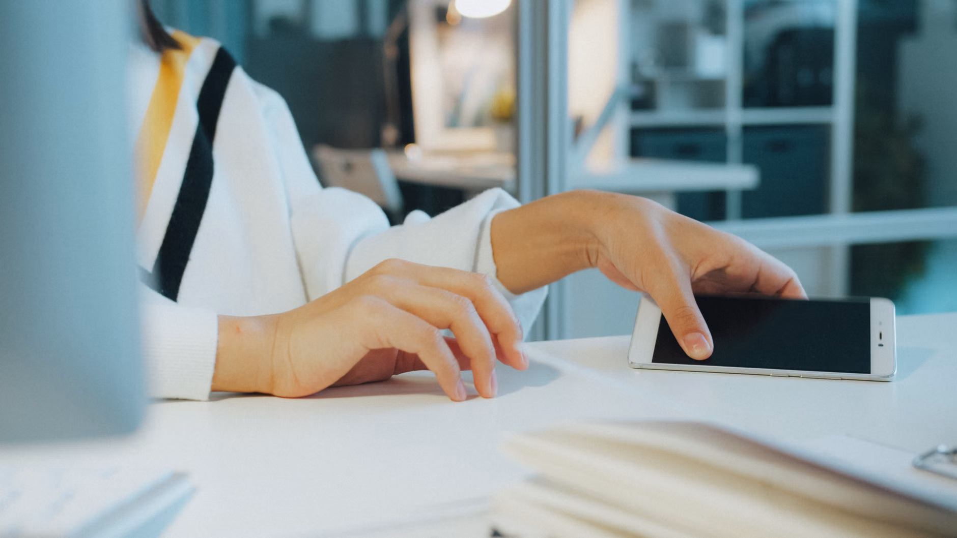 2026 Digital Banking Security: A Practical Guide to Protecting Your Assets 1 A person using biometric fingerprint authentication on a smartphone.