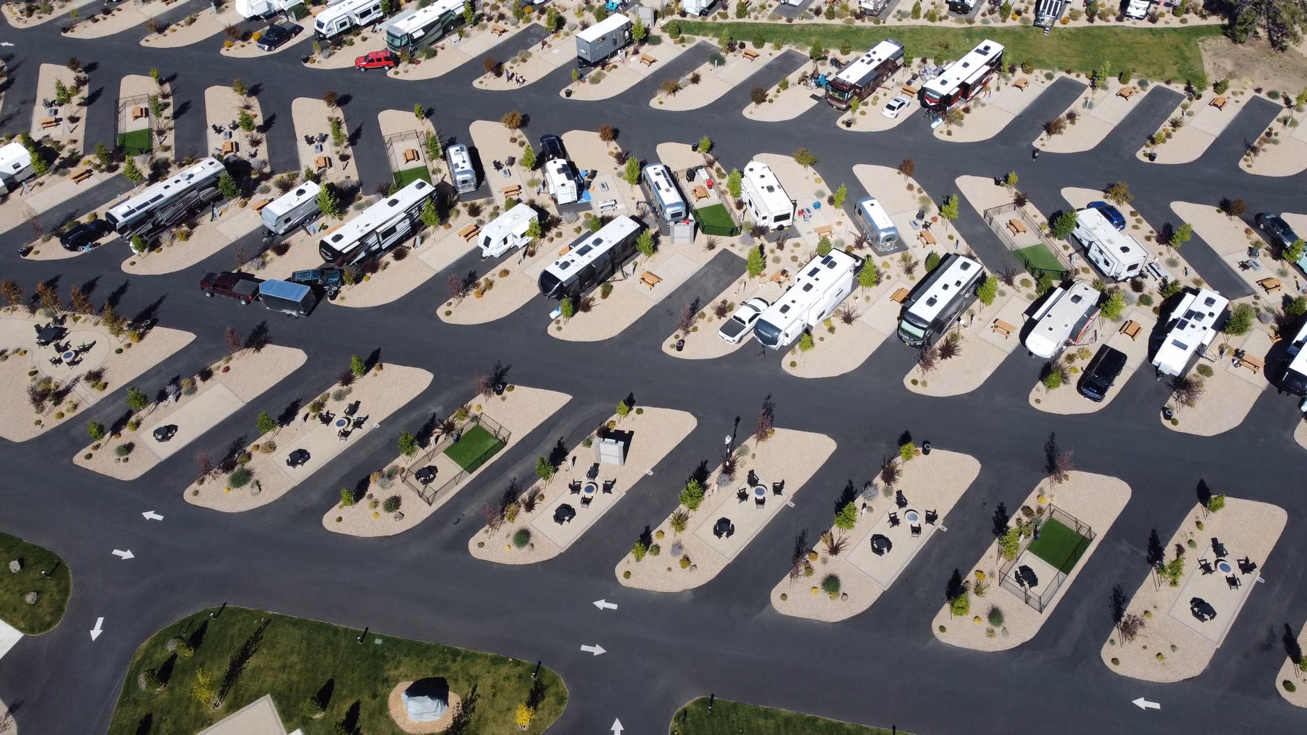 The Senior Traveler’s Guide to Accessible Hot-Spring Resorts: Planning for Safety and Comfort 2 Seniors reviewing an accessible resort layout on a flat, paved path.
