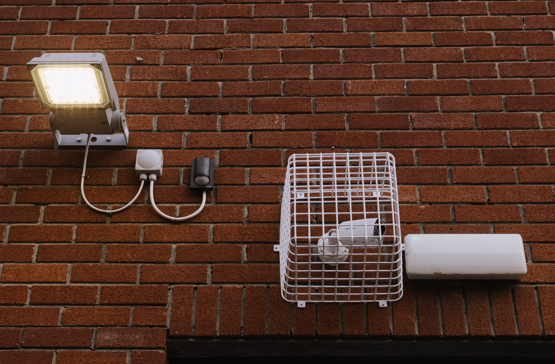 Discreet wall-mounted ambient sensor for home safety.