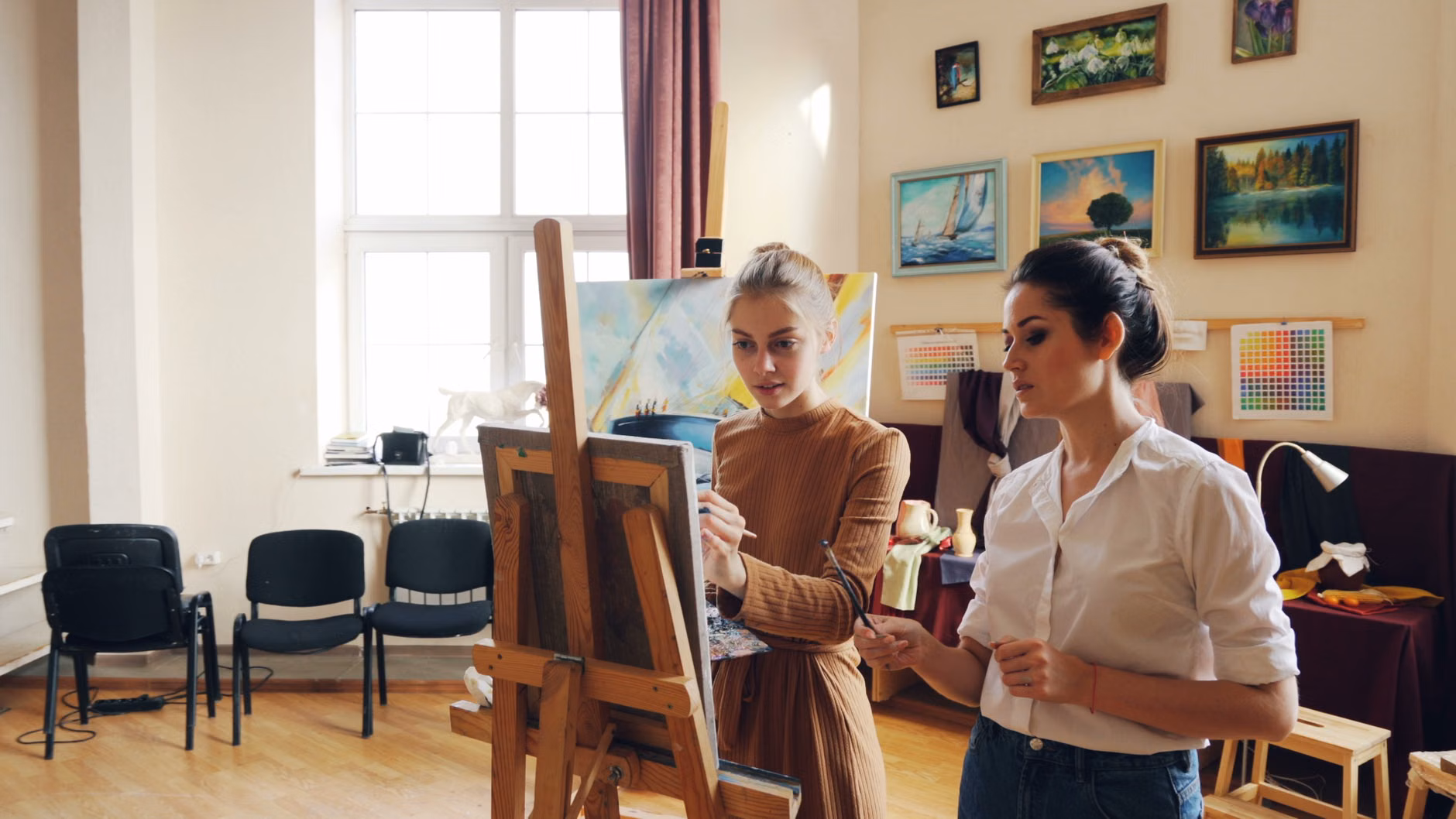 An accessible and well-lit community art studio space.