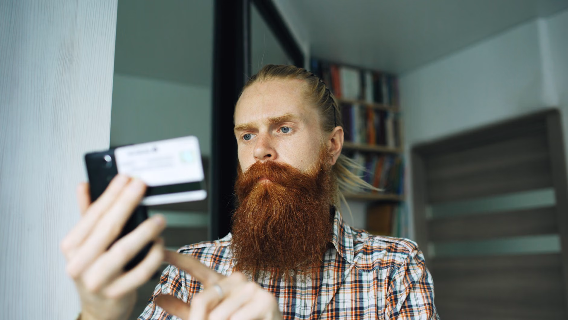 Navigating Digital Public Services: A Practical Guide for Secure and Efficient Access 2 Close-up of a smartphone being used for secure identity verification.