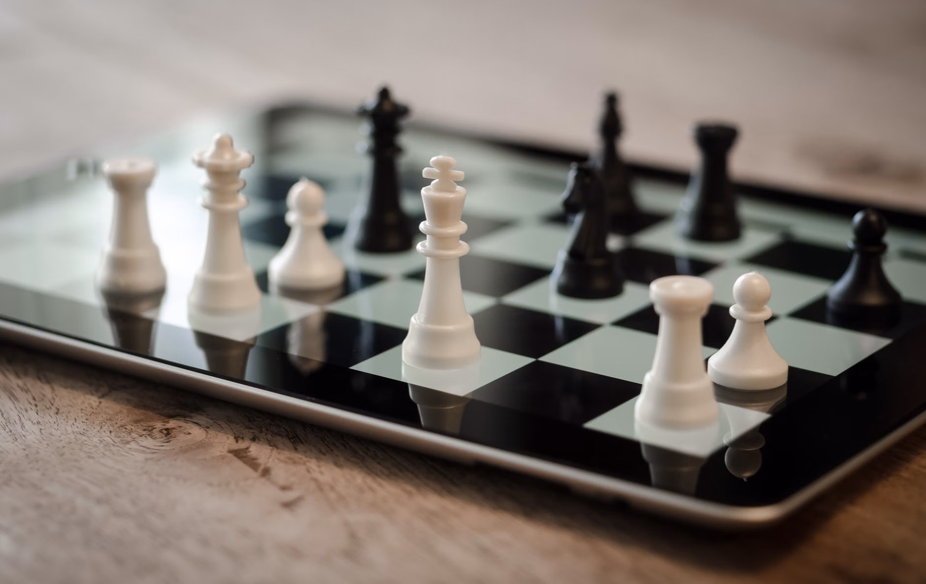 A tablet displaying a chess application for learning tactics.