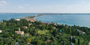 A scenic view of a historic villa with accessible garden paths.