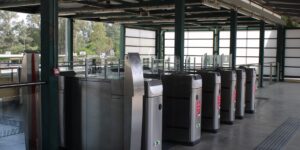 A modern, accessible train station lounge designed for comfort and ease of movement.
