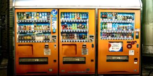 A modern, accessible public service kiosk in a brightly lit, professional setting.