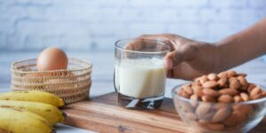 A healthy, balanced spread of biotin-rich foods on a wooden table.