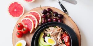 A balanced selection of healthy, Vitamin B12-rich foods on a kitchen table.