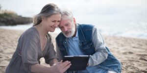 A senior couple using a tablet to navigate digital identity services.