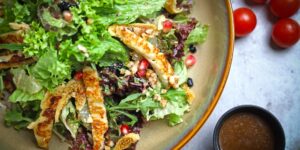 A healthy, nutrient-dense meal featuring B2-rich ingredients like leafy greens and lean protein.