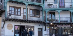 A scenic, accessible outdoor cafe in a historic plaza.