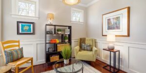 A welcoming community reading nook with shelves and comfortable chairs.