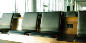 A modern, accessible airport lounge interior designed for comfort and ease of movement.