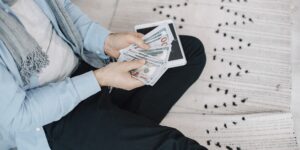An older adult managing digital finances securely on a tablet.