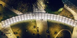 A well-lit, safe public park path at twilight designed for accessibility.