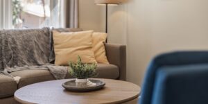A well-lit, safe living room environment designed for senior safety and comfort.