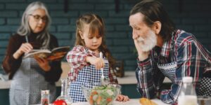 An active senior preparing a nutritious meal in a bright kitchen.